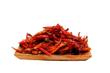 Dried chili pepper, chillies spicy served on wooden plate. Isolated on white background 