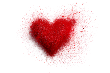 Red heart exploding with pink and white particles on black background