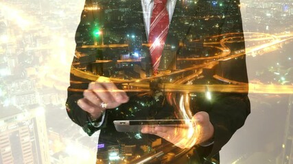 A businessman interacts with a tablet, set against a vibrant cityscape illuminated with lights. The image features a digital overlay, merging technology with urban life, showcasing the intersection of - Powered by Adobe