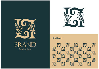 Floral letter 'L' monogram with seamless pattern