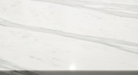 Elegant White Marble Surface with Subtle Grey Veining and Soft Lighting