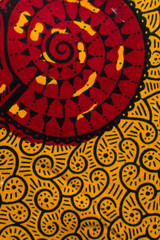 top view of yellow ankara fabric, flatlay of nigerian wax cloth with designs, spread out yellow ankara material