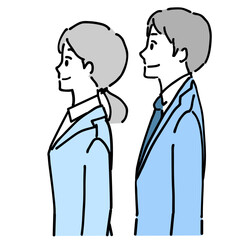 笑顔のスーツ姿の若い男女の横顔