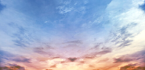 Beautiful colorful sky with dramatic clouds at sunset and sunrise, vibrant gradient blue, pink orange heaven background, natural cloudscape scenic evening morning sky wallpaper