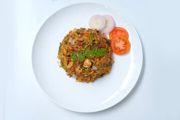 Flavorful Kottu Roti with Curry Leaves and Fresh Vegetables.