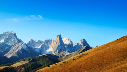 Fototapeta premium vibrant mountainous landscape under clear blue sky