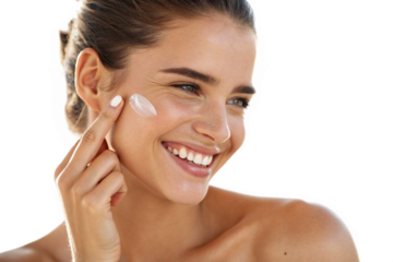 Beautiful caucasian woman applying cosmetic cream on her face isolated on transparent background, enjoying a spa day and skincare treatment