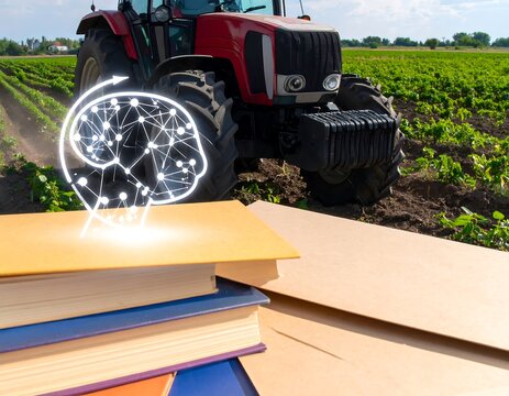 Books and tractor in a field, futuristic brain graphic