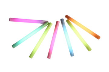 Assorted colorful glow sticks arranged in a radial pattern on a transparent background. background removed