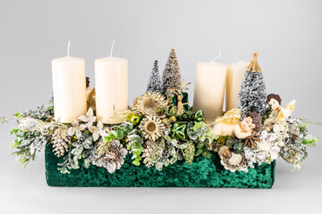 Christmas table composition. Beautiful decoration. Christmas trees, candles, stars, lights and...