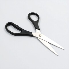 Black scissors on a light background