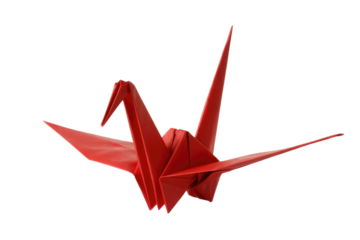 A vibrant red origami crane, meticulously folded, stands out against a stark transparent background. background removed