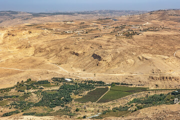 Landscape of the Holy Land as viewed from the Mount Nebo. View towards the Amman, capital city of...