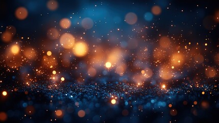 Blurry bokeh background of golden twinkling lights on deep blue, dreamy and magical atmosphere for romantic wedding invitations and fantasy themes