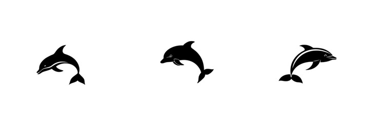 Obraz premium Stylized black-and-white dolphins swimming in minimalist design with simple silhouettes