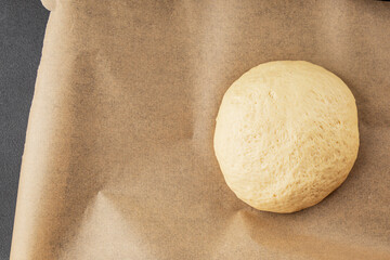 Dough raw cooking yeast, flour, water tasty snack fresh delicious gourmet food background on the table rustic food top view copy space