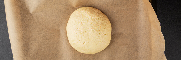 Dough raw cooking yeast, flour, water tasty snack fresh delicious gourmet food background on the table rustic food top view copy space