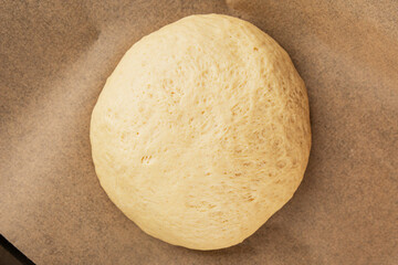 Dough raw cooking yeast, flour, water tasty snack fresh delicious gourmet food background on the table rustic food top view copy space