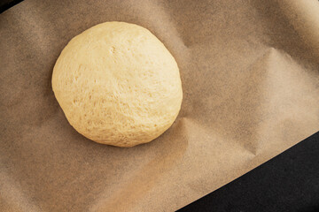 Dough raw cooking yeast, flour, water tasty snack fresh delicious gourmet food background on the...