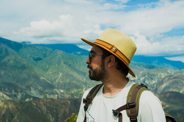 Man enjoying panoramic view of Chicamocha Canyon in Colombia