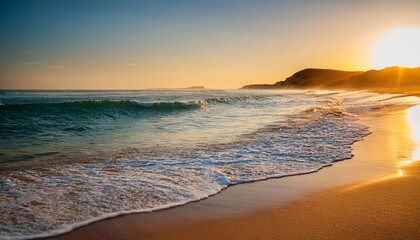 serene untouched beach at sunset soft light illuminating gentle waves and golden sand