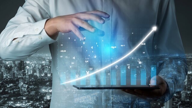 A business professional showcases futuristic financial data with an upward trend displayed on a digital tablet, symbolizing success and innovation in a vibrant night cityscape. Copula