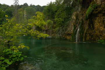 Lush scene with waterfalls, lake and clear water at the Plitvice Lakes National Park (Plitvička Jezera, Croatia)