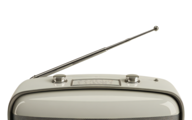 Close up of the top of a vintage cream colored portable television with an extended silver antenna isolated on transparent background