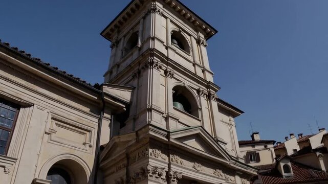 Architectural feature detail of bell tower belonging to church located in Turin