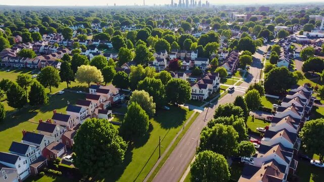 Aerial Drone View of South Jersey Neighborhood with Distant Skyline View of Philadelphia During Summer