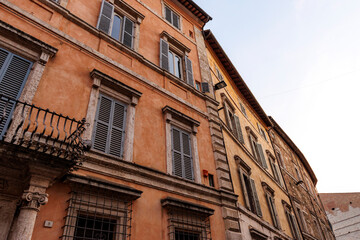 Facade of old houses in the historic center of Perugia, Umbria, Italy, Europe