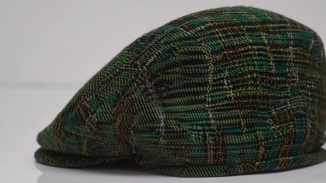 Verdant Tweed Sporting Cap Silhouette of Verdant Tweed Hunting Headpiece or Flat Cap sport