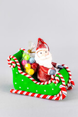 Christmas table composition. Beautiful decoration. Christmas trees, candles, stars, lights and elegant accessories. Merry Christmas and Happy Holidays, Template.