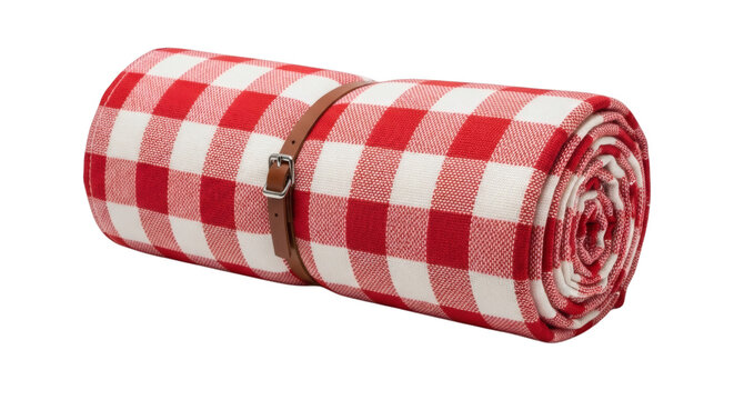 Rolled red checkered picnic blanket tied elegantly awaiting outdoor adventures and summer leisure activities