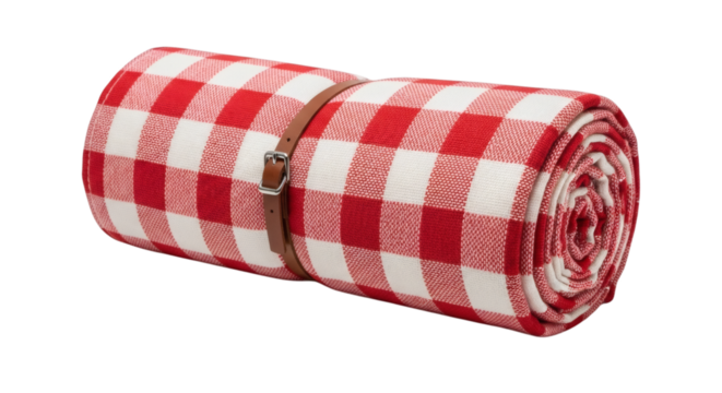 Rolled red checkered picnic blanket tied elegantly awaiting outdoor adventures and summer leisure activities