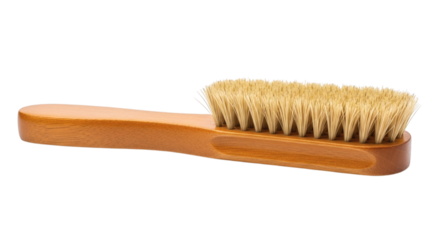 Shoe brush made of wood, isolated on seamless white background, tool to make shoes shine so shoes look nice.
