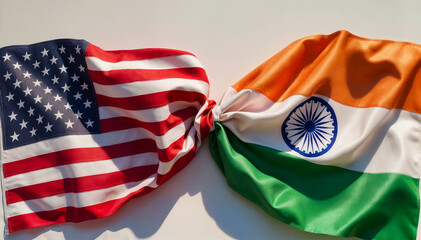 flags of the usa and india tied in a knot and lying next to each other on a white background