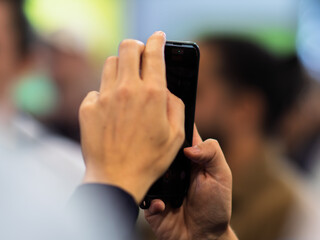 Capturing Moments: A Close-Up of a Person Holding a Smartphone