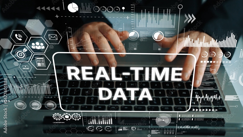 Poster hands typing on laptop surrounded by innovative graphics representing real-time data analytics and i