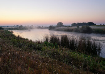 Misty dawn over the lake.