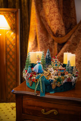 Christmas table composition. Beautiful decoration. Christmas trees, candles, stars, lights and elegant accessories. Merry Christmas and Happy Holidays, Template.