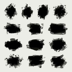 Collection of abstract black ink brush strokes and splatters on white background, ideal for graphic design elements, artistic overlays, or text backgrounds