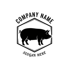 Black pig silhouette logo design within a hexagonal frame, suitable for a company or brand related to farming or meat products.