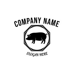 A black silhouette of a pig inside an octagonal frame, with text above and below.