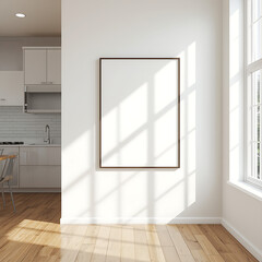 A modern kitchen interior features an empty vertical poster frame on a clean white wall, perfect for mockups or design template presentations in a cozy dining space.