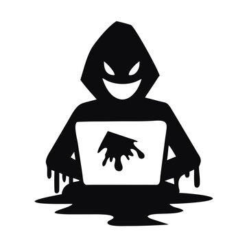 Silhouette of sinister hacker using a laptop with malicious intent