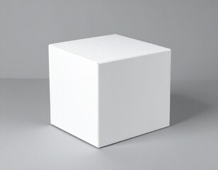 Clean white cube casting a subtle shadow on a neutral gray background