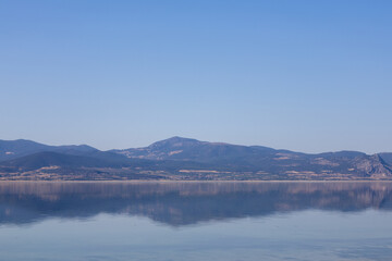 Midday Serenity by the Lake A Majestic View Framed by Mountains sun