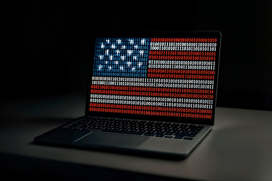 Laptop  Screen with Binary Code in American Flag Colors, Blurred Dark Empty  Background 