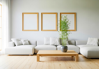 Modern living room with three empty frames and bamboo plant
